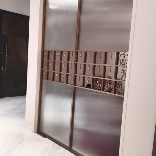 Brush Gold Profile Flutter Glass Ghanti Swing Door