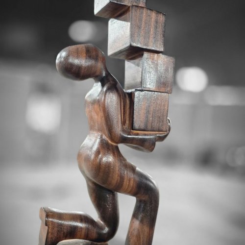 Balancing Work Life Wooden Statue