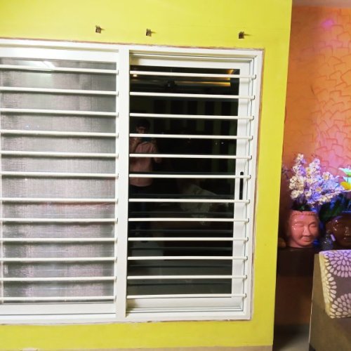 Aluminium Sliding Domal Grill Window