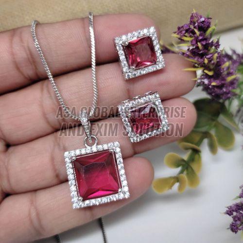 Ladies Brass Party Wear Pink Stone Pendant Set