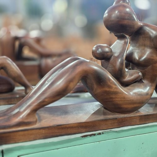 Child on Mothers Lap Wooden Statue