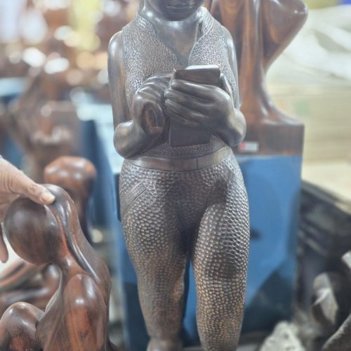 Lady With Mobile Wooden Statue
