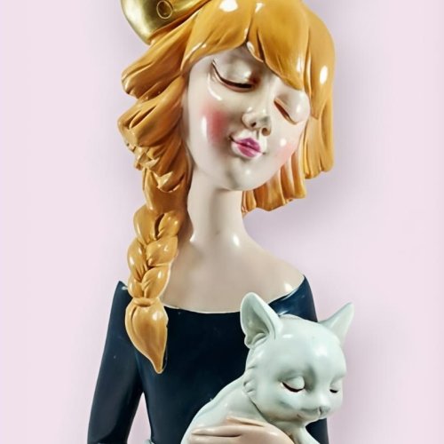 Cute Girl Holding Cat Figurine