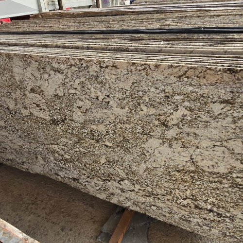 Alaska Gold White Granite Slab