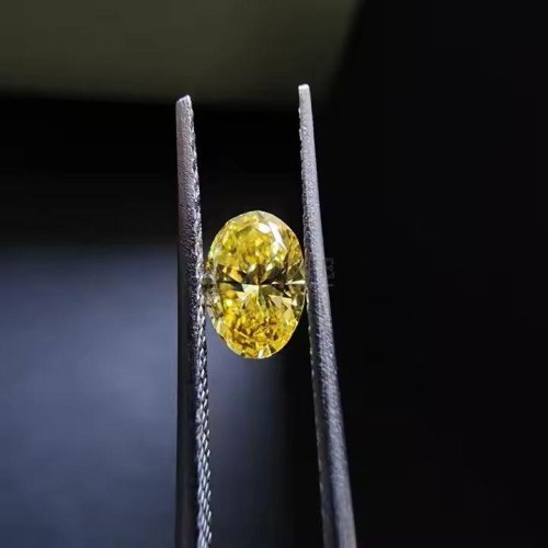 0.37 Carat Oval Cut Fancy Yellow CVD Diamond