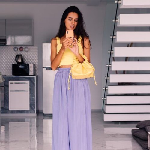 Ladies Yellow Solid Casual Wear Crop Top Palazzo Set