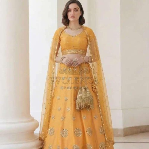 Maze Yellow Embroidered Silk Bridal Lehenga Choli