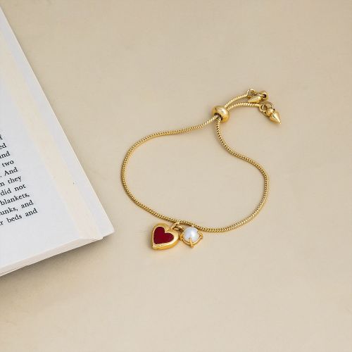 Heart and Pearl Gold Tone Adjustable Charm Bracelet