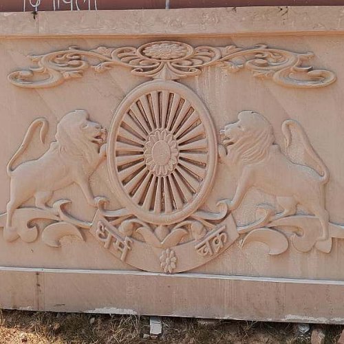 Dharma Chakra Carved Sandstone Wall Panel