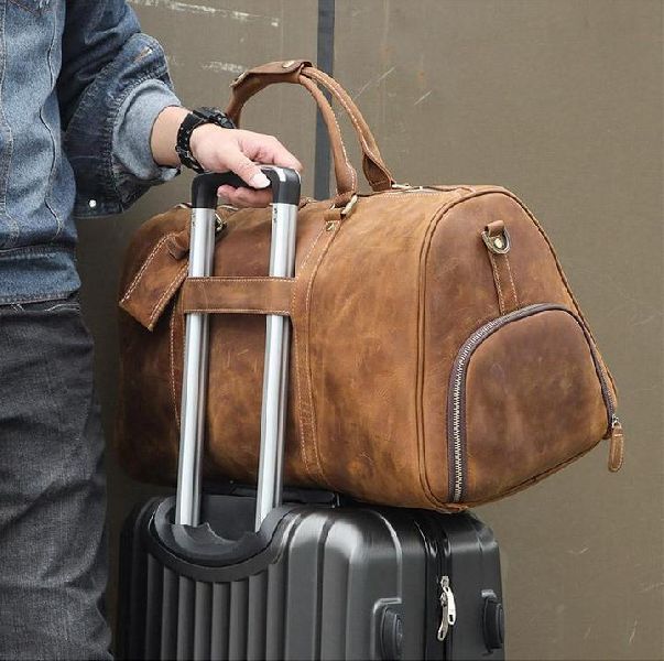 vintage leather duffle bag with shoe compartment