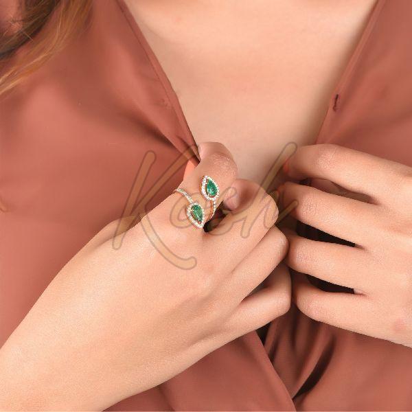 Rose Gold Pear Gap Emerald Diamond Ring