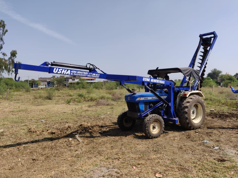 New Holland Tractor Fitted Pole Erection And Post Hole Digger