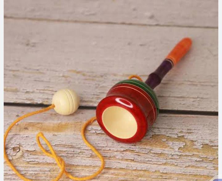 Wooden Swinging Ball Toy