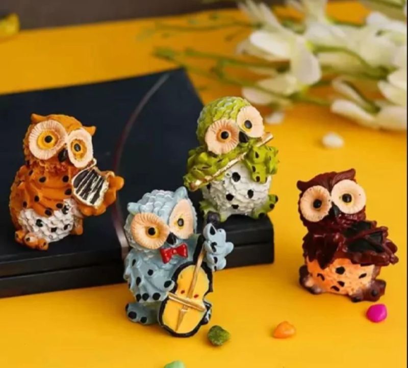 Four Musical Owl Statue Set