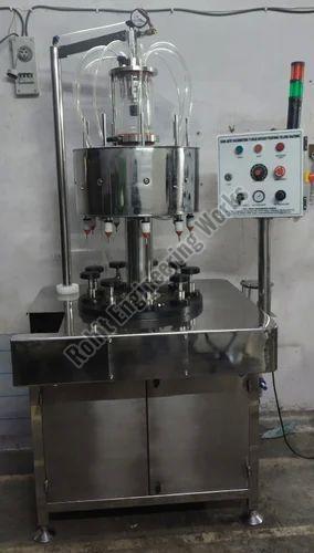 Vaccumetric 9 Head Rotary Perfume Filling Machine