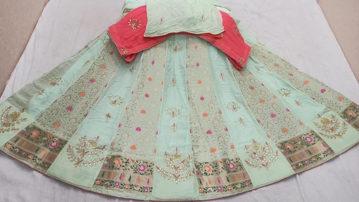 Pista Green Uppada Silk Semi Stitched Lehenga Choli
