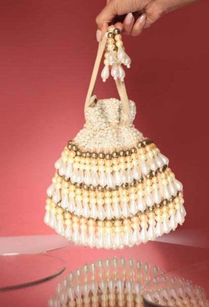 Ladies Beige They Shay Potli Hand Bag