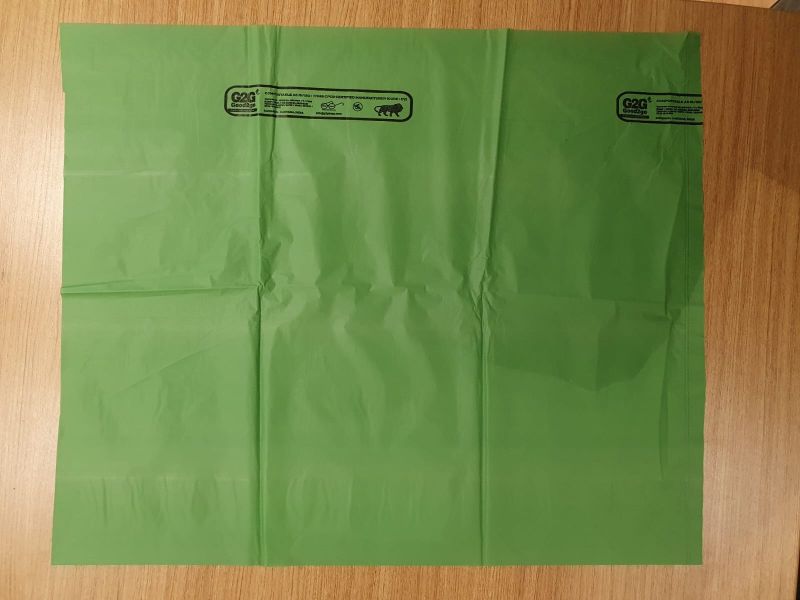 dark green compostable garbage bag