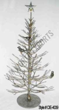 Silver Metal Christmas Tree Sculpture with Ornate Branches and Star Topper