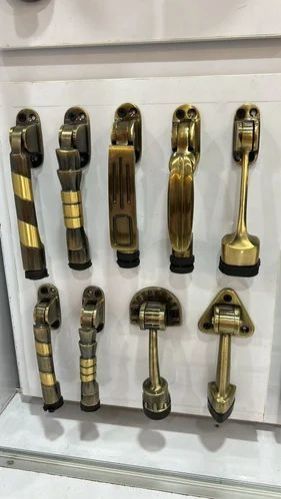 Antique Brass Door Stoppers and Holders