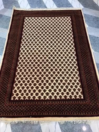 Brown Hand Knotted Woolen Carpet