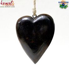 Dark polished wooden heart