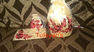 Embroidered envelope, small coin potli, big potli