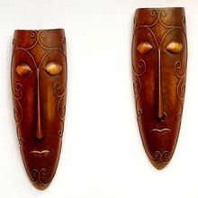 iron male female mask wall decor