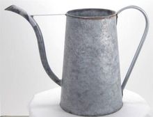 antique metal watering can