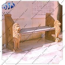 beige sandstone lion status bench