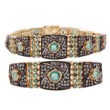 Mixed metal emeralds diamonds studded bracelet