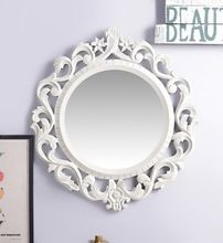 carved wooden mirrors