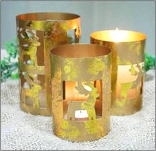 Reindeer cut tea light candle holder