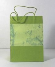 handmade paper given marble print handles bags