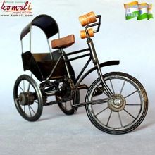 wrought iron rickshaw toy