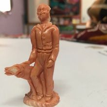 Natural Coral Carving of Men Standing with Dog