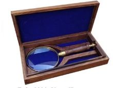 Nautical magnifying glass in wooden box
