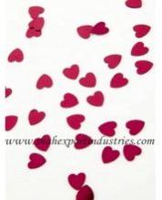 Red heart confetti for wedding table