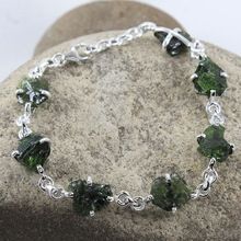 Rough peridot gemstone silver bracelet