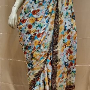 Samuss satin digital print sarees with Swarovski border and heavy Swarovski blouse