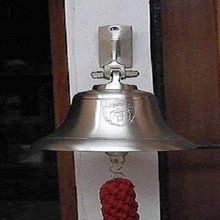 Silver maritime ship bell with lanyard