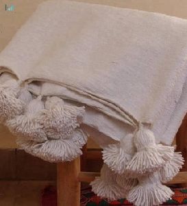 Moroccan pom pom cotton blankets