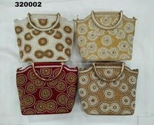 Ethnic style stone work evening handbag