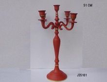 aluminium candelabra in earthen pot