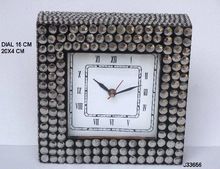 Metal mosaic on wood table clock