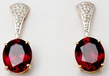 Glass Filled Red Oval Cut Ruby Earrings