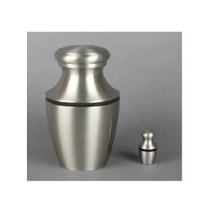 Brass cremation urn with pewter finish