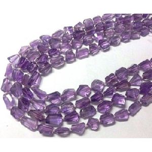 Amethyst faceted tumbled stones