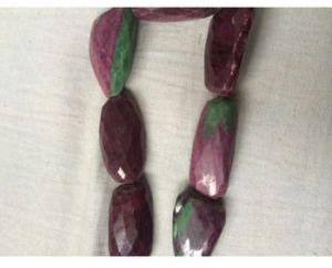 Ruby Zoisite faceted tumbled stone