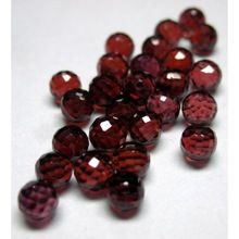 faceted ball shapes red garnet